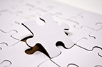Puzzle piece being inserted into it's corresponding spot